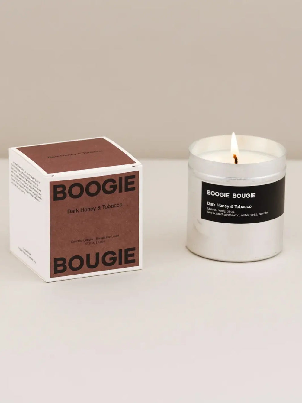 Boogie Bougie Dark Honey and Tobacco candle and brown packaging on a white background | Twentyseven Toronto