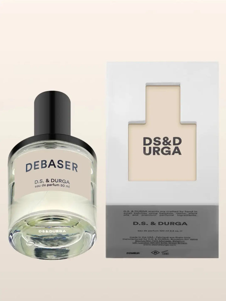 D.S. & Durga Debaser perfume bottle and packaging on a beige background | Twentyseven Toronto
