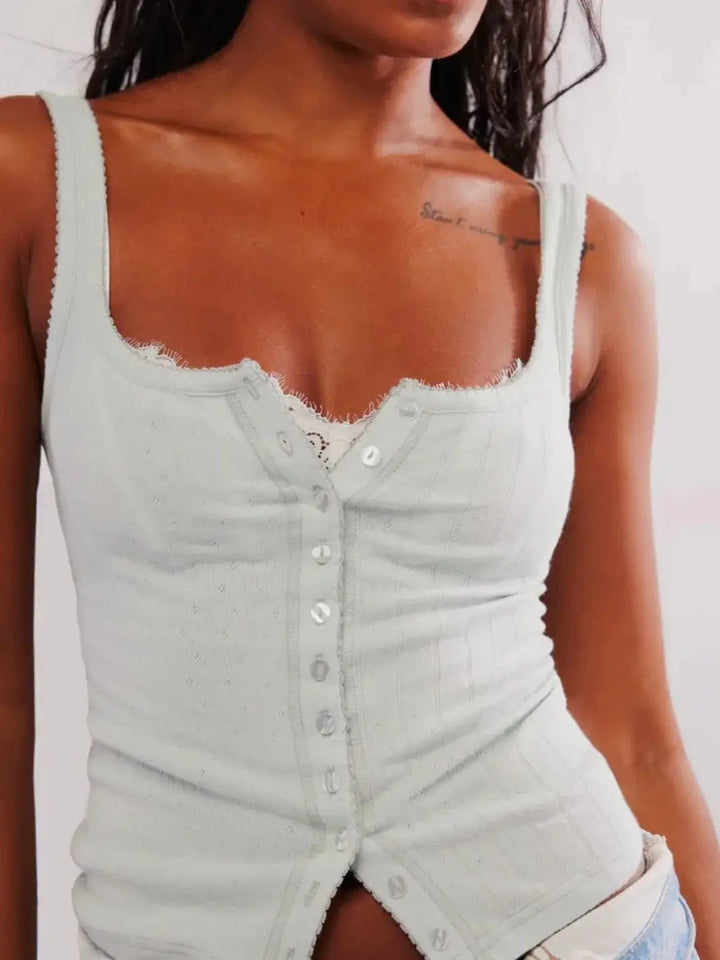 A close-up front view highlights the delicate lace trim, button-down front placket, and fine open-knit texture of the Free People End Game Pointelle Tank - Pale Aqua | Twentyseven Toronto