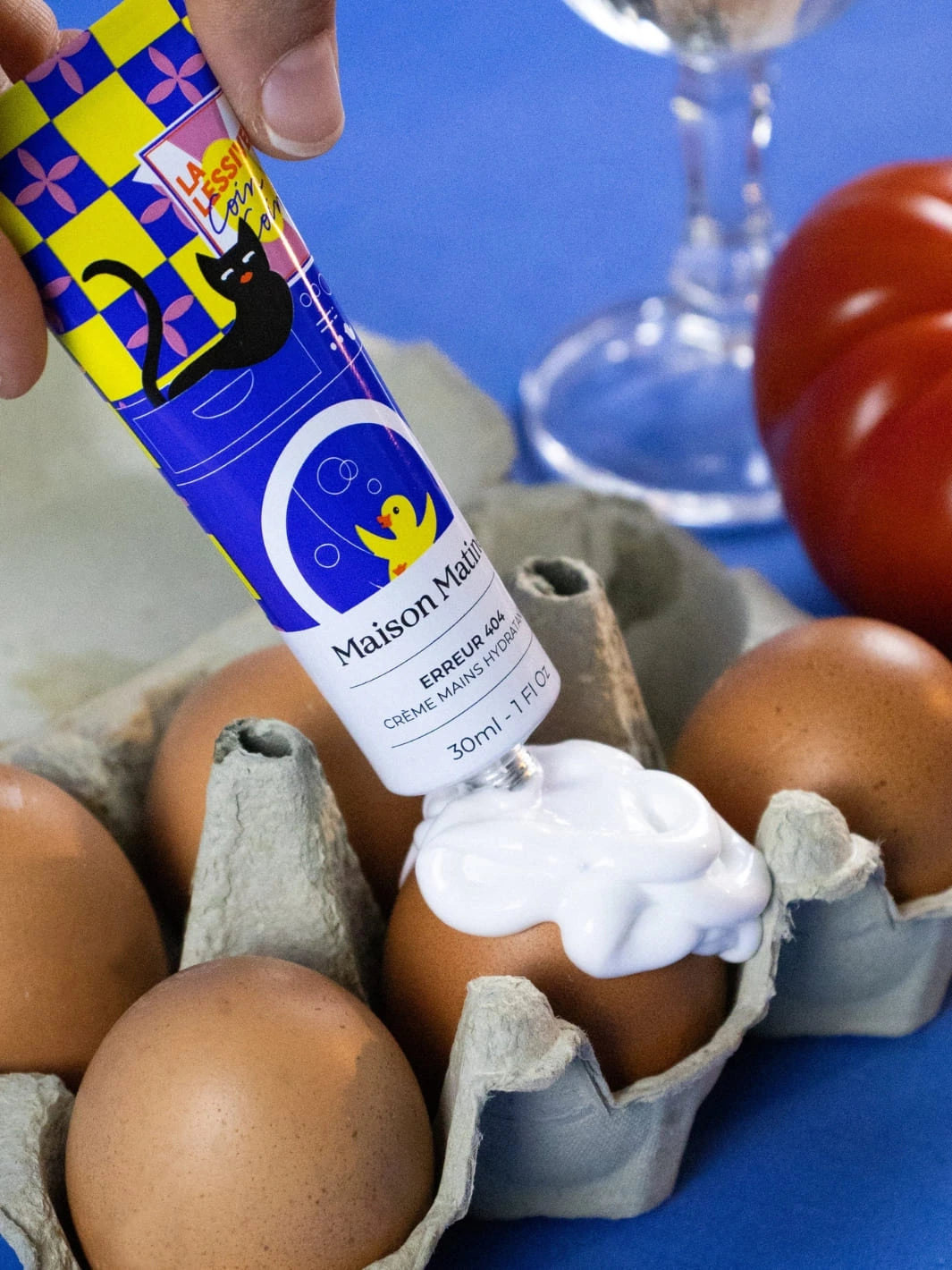 Maison Marie Erreur 404 Hand Cream product texture with eggs on a blue background 30ml | Twentyseven Toronto