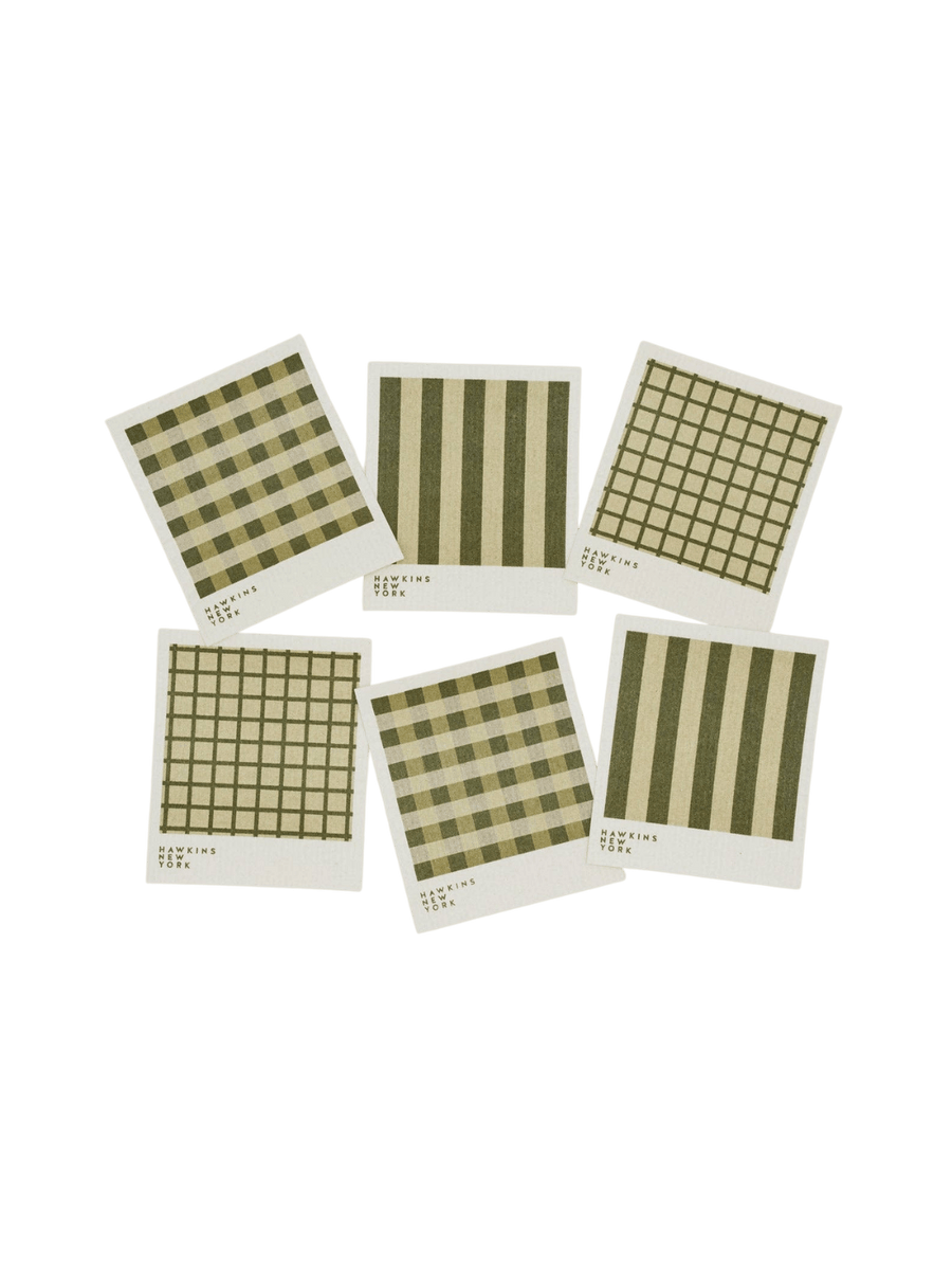 Six sponge cloths featuring assorted green plaid, striped, and windowpane patterns are arranged against a black background to showcase the complete Essential Swedish Dishcloth in Sage/Olive (Set of 6) from Hawkins New York | Twentyseven Toronto