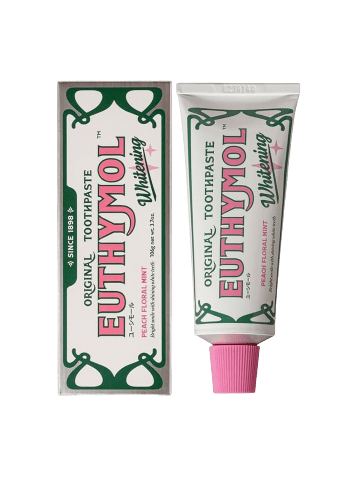 The silver-trimmed box and corresponding tube of Euthymol Original Whitening Pink Japanese Toothpaste are displayed side-by-side against a transparent background | Twentyseven Toronto