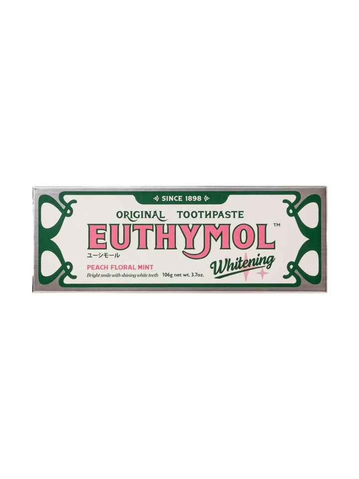 The horizontal front face of the packaging for Euthymol Original Whitening Pink Japanese Toothpaste features its iconic "Since 1898" heritage branding and "Peach Floral Mint" flavour profile | Twentyseven Toronto
