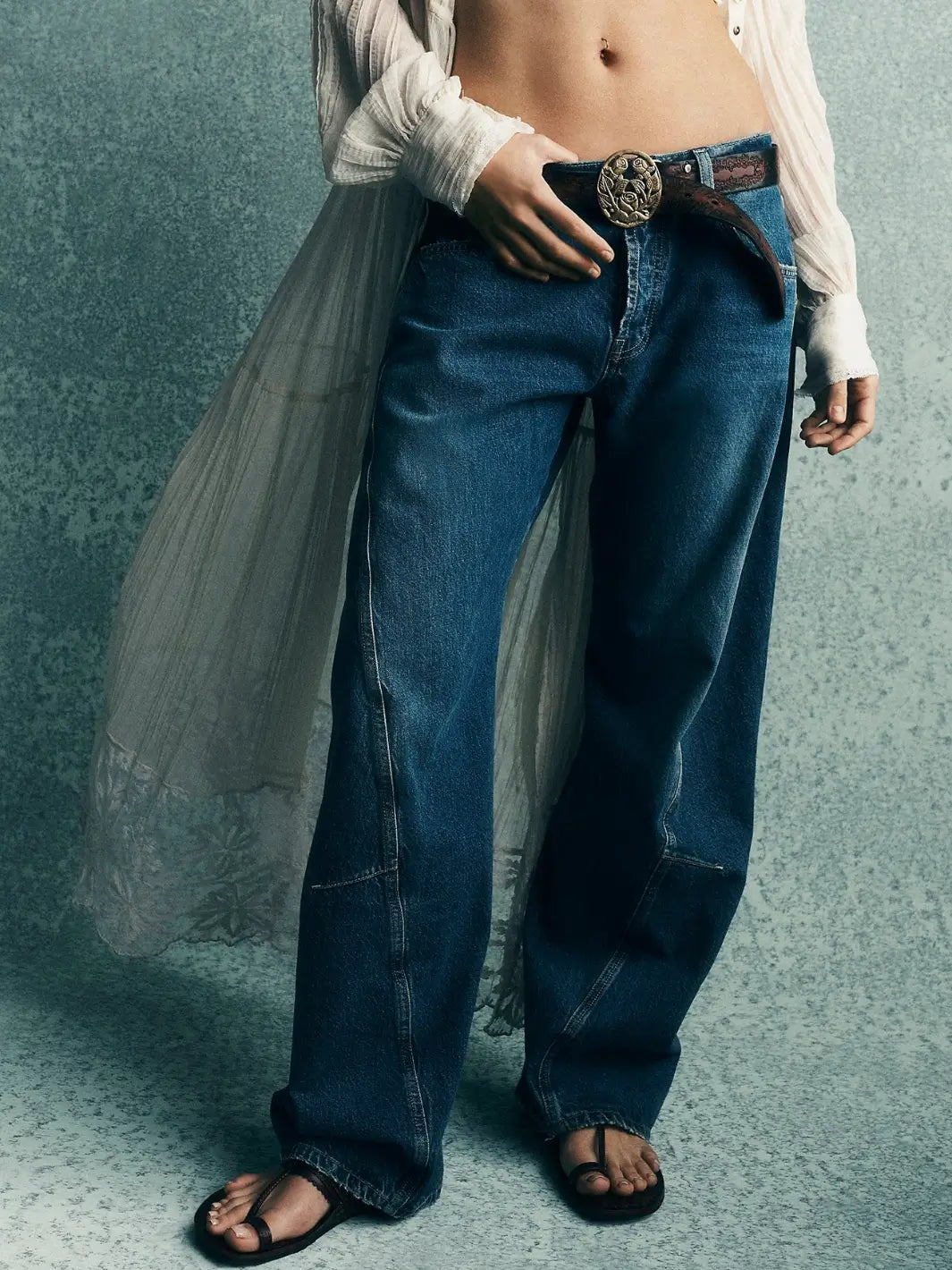 The mid-rise fit, structured denim texture, and twisted panel construction of the Free People Fable Twisted Seam Jean in Heartsong | Twentyseven Toronto