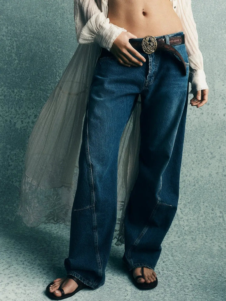 The mid-rise fit, structured denim texture, and twisted panel construction of the Free People Fable Twisted Seam Jean in Heartsong | Twentyseven Toronto