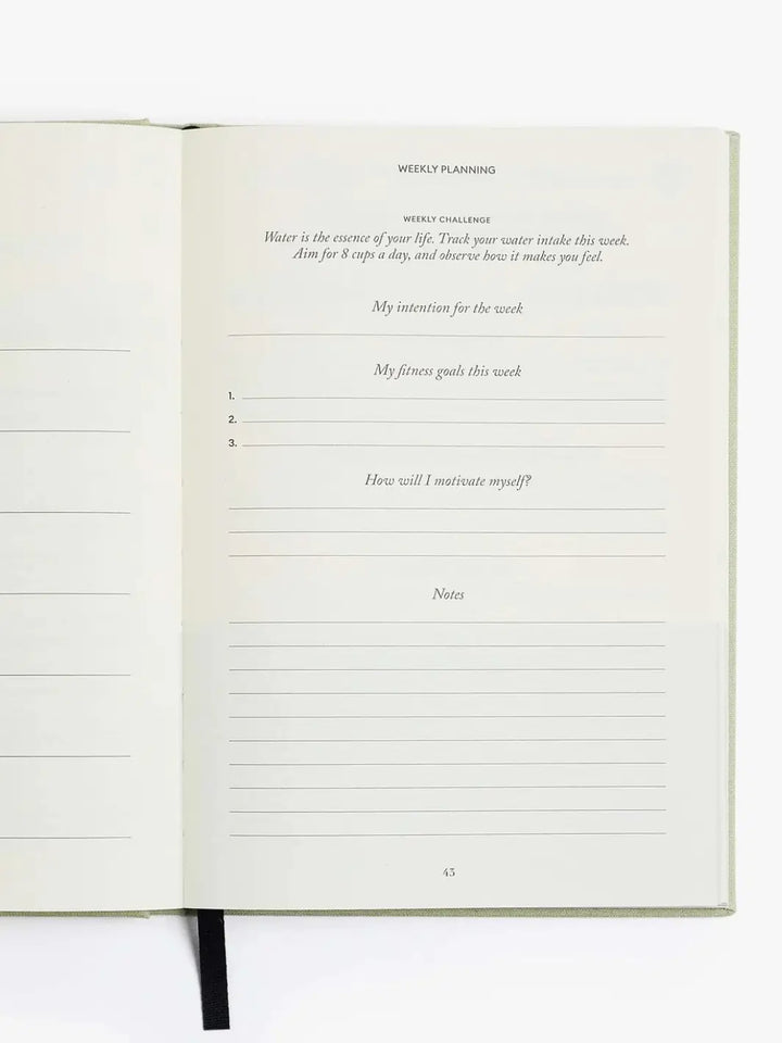 The "Weekly Planning" template page is shown blank inside the Intelligent Change The Five Minute Journal Health & Fitness Edition, ready for goal setting and water intake tracking | Twentyseven Toronto