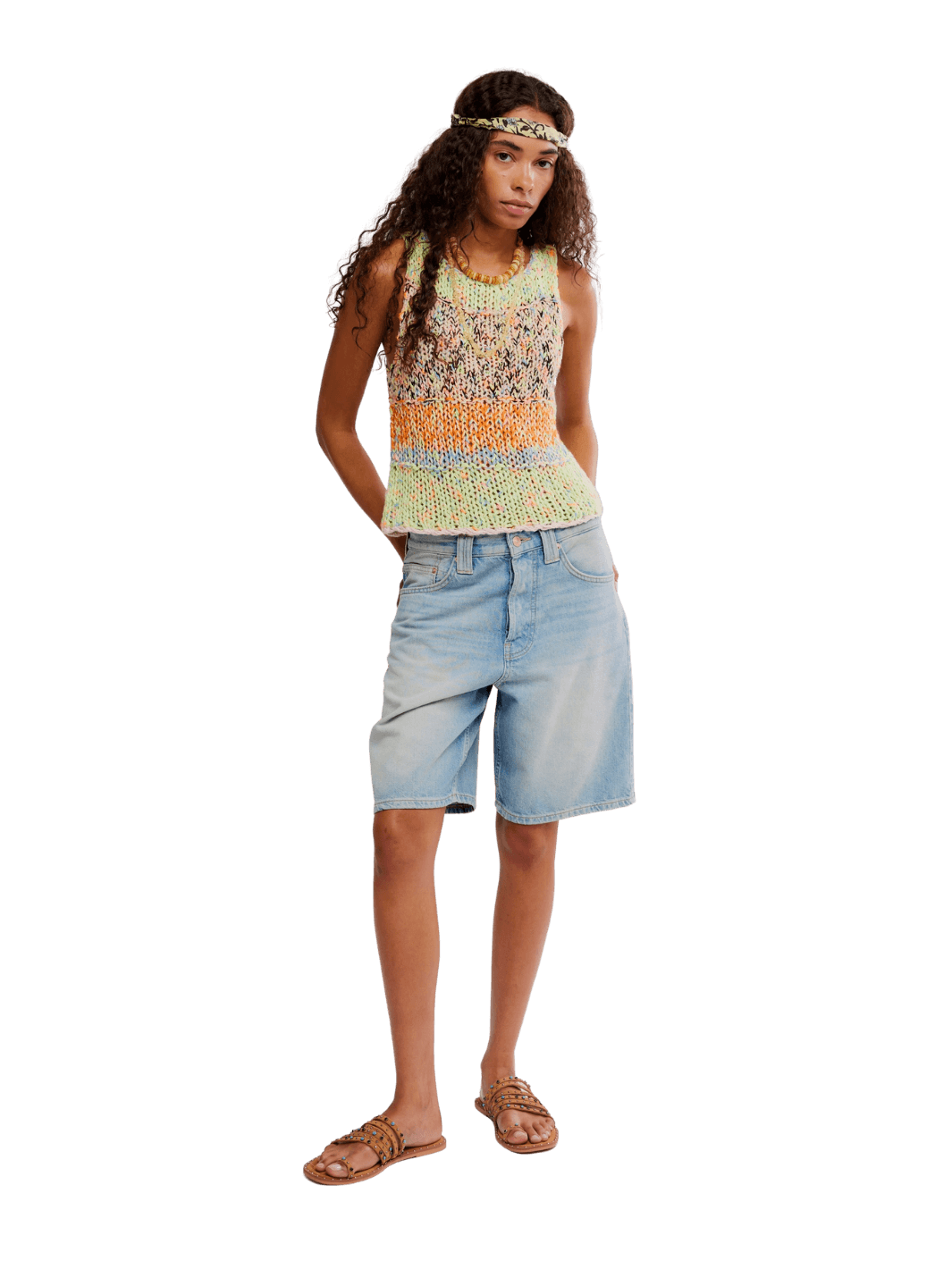 Woman wearing a colorful 'Flea Market Knot Tank' sleeveless top in 'Paradise Combo' and denim shorts on a transparent background | Twentyseven Toronto