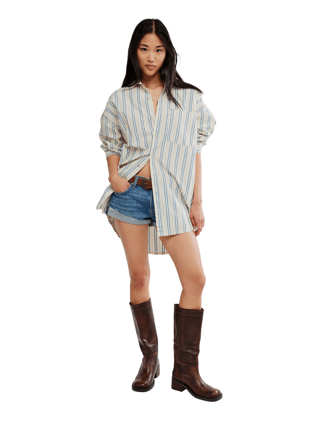A model wearing the oversized, vertically striped Free People We the Free Freddie Striped Shirt in Ivory Combo paired with denim shorts | Twentyseven Toronto