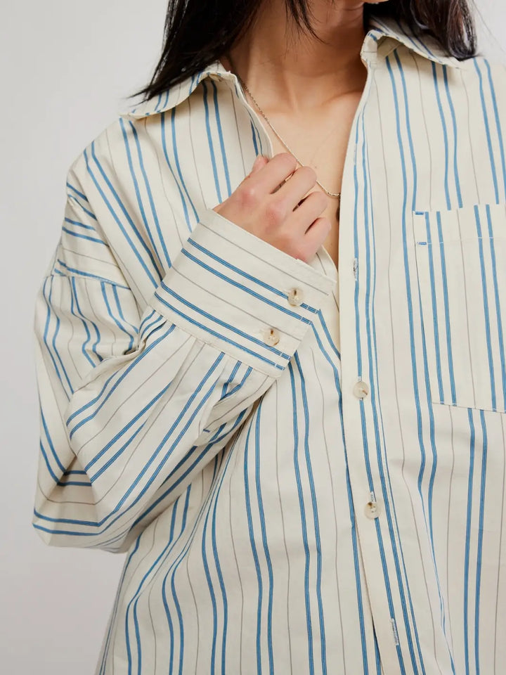 A close-up shot details the point collar, chest pocket, and lightweight cotton fabrication of the Free People We the Free Freddie Striped Shirt in Ivory Combo | Twentyseven Toronto