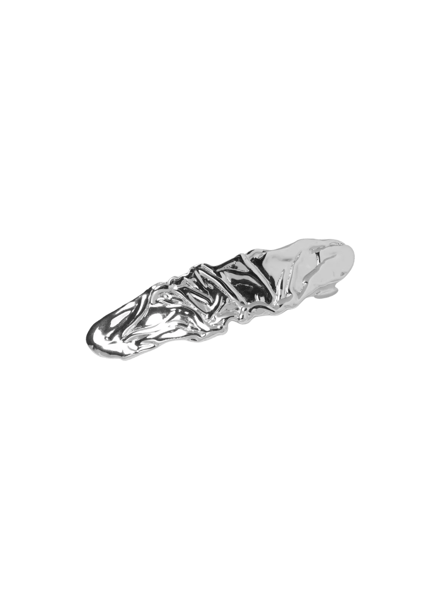 The Frida Barrette in Silver from Wolf Circus highlighting its elongated silhouette and molten, high-shine silver texture | Twentyseven Toronto