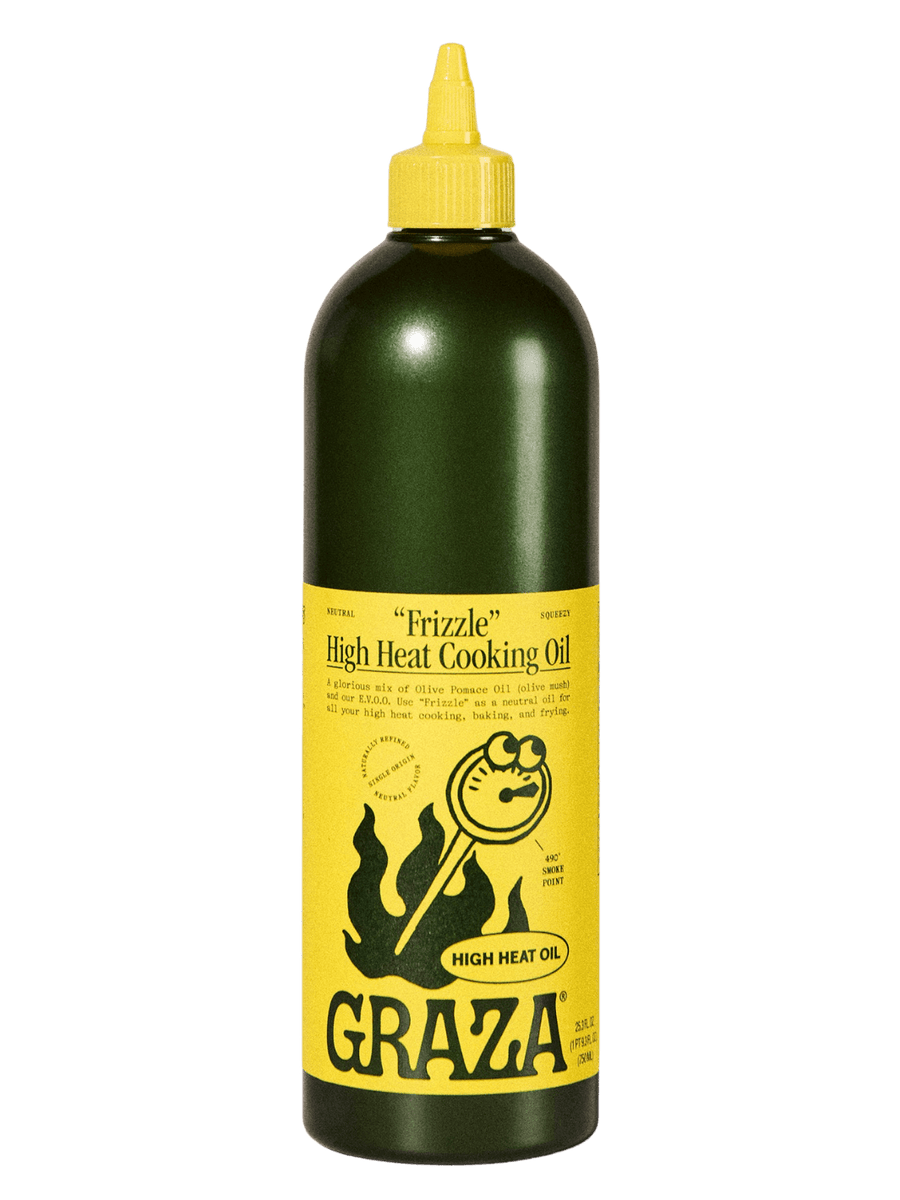 750ml bottle of Graza 'Frizzle' High Heat Cooking Oil with yellow label and cap on a transparent background | Twentyseven Toronto