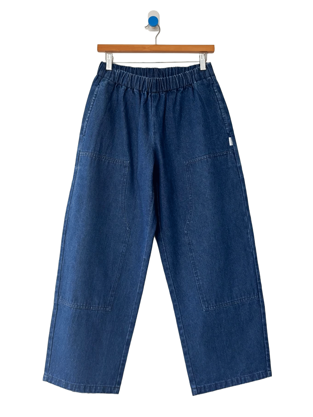 Le Bon Shoppe Gardener’s Pants in Blue Denim featuring an elastic waistband, relaxed tapered leg, and carpenter-inspired front patch pockets | Twentyseven Toronto