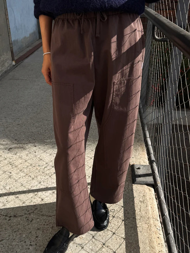 Le Bon Shoppe Gardener’s Pants in Espresso styled with a navy sweater and black loafers, showing the relaxed wide-leg fit and front patch pockets | Twentyseven Toronto