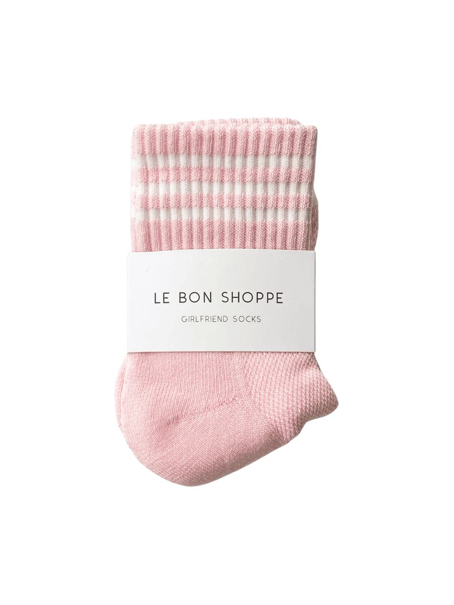 The light pink Le Bon Shoppe Girlfriend Sock in Peony is neatly folded and wrapped with a white branded paper sleeve | Twentyseven