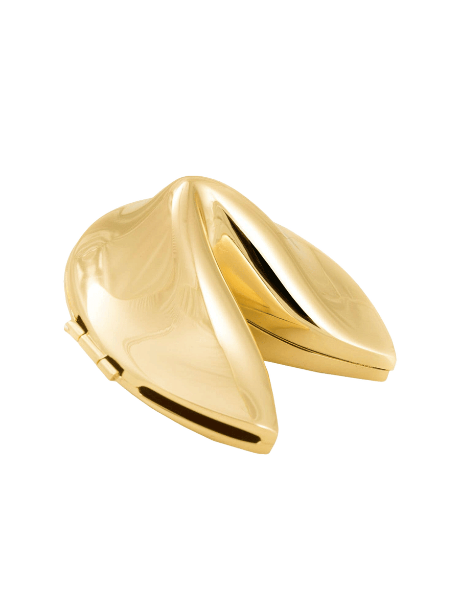 Gold-plated fortune cookie keepsake with a polished finish and hinged design on a white background | Twentyseven Toronto