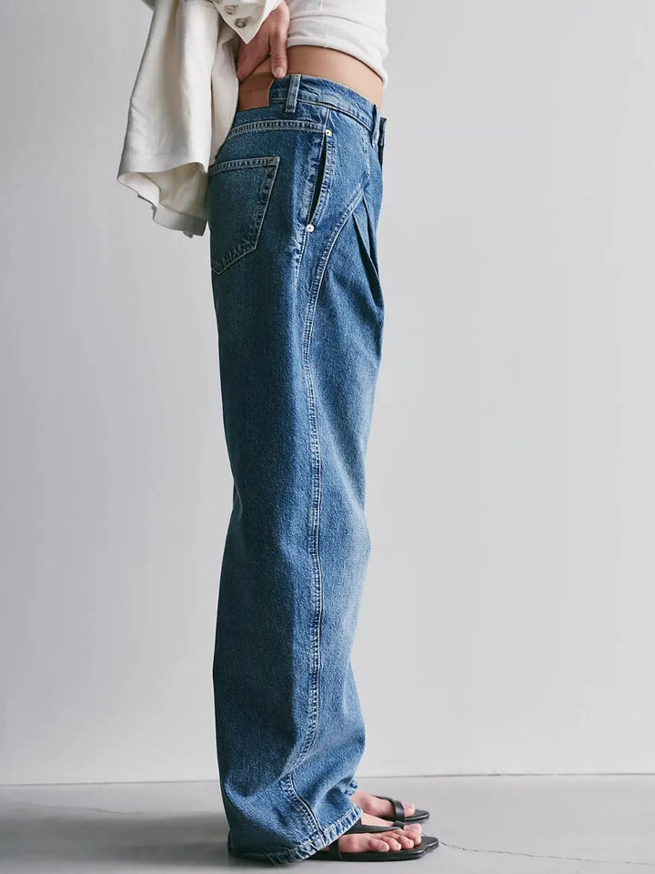 Side profile showing the full-length wide leg and side seam details of the Free People We the Free Golden Hour Trouser Jeans in Deacon Blue | Twentyseven