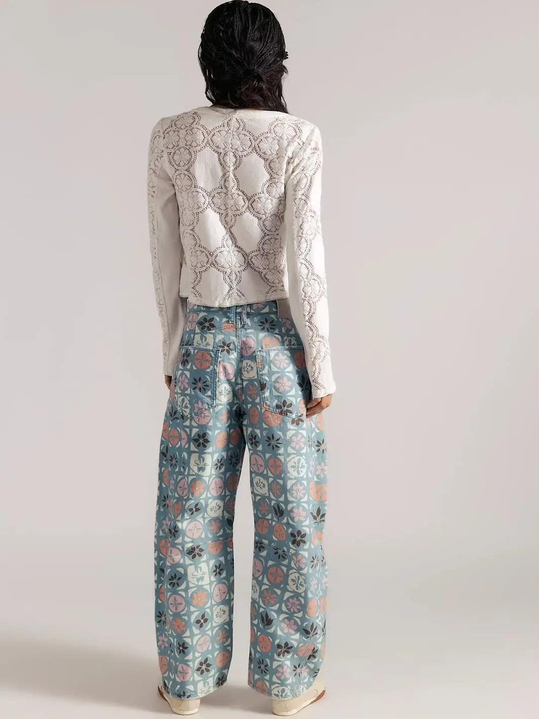 A direct rear view focuses on the stitched pocket placement and loose drape of the Free People Good Luck Printed Barrel Jeans in Jade Combo Ditsy Block | Twentyseven Toronto