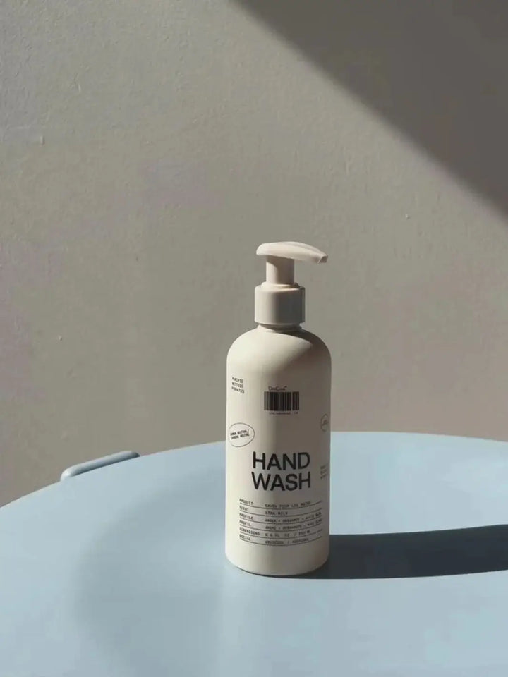 A single bottle of Dedcool Hand Wash 01 "Taunt" standing upright on a light blue tabletop | Twentyseven Toronto
