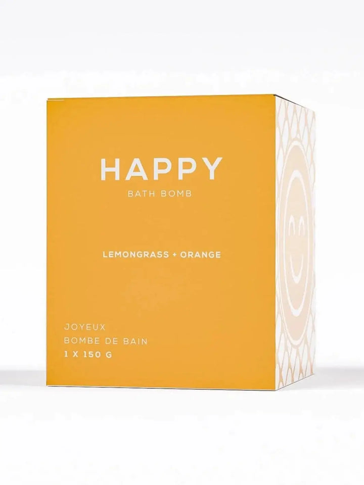 The yellow rectangular packaging of the Bare Skin Bar HAPPY Bath Bomb against a white background | Twentyseven Toronto