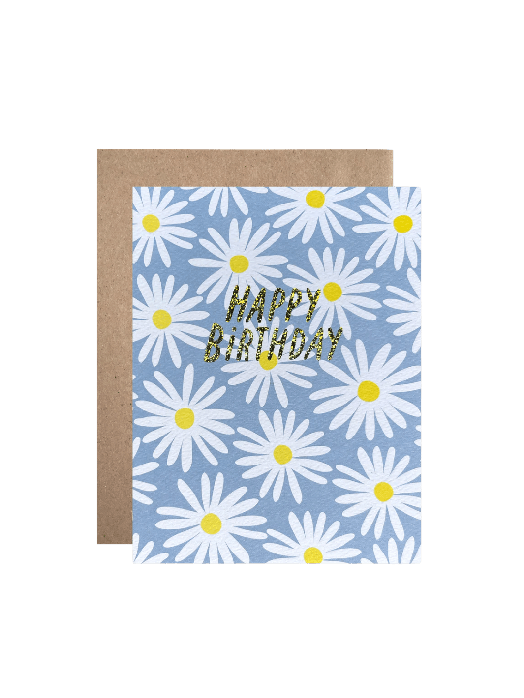 The Happy Birthday Daisies Card from Hartland Cards features a repeating pattern of white daisies with yellow centers on a light blue background, paired with a brown kraft envelope and glittering gold text | Twentyseven Toronto