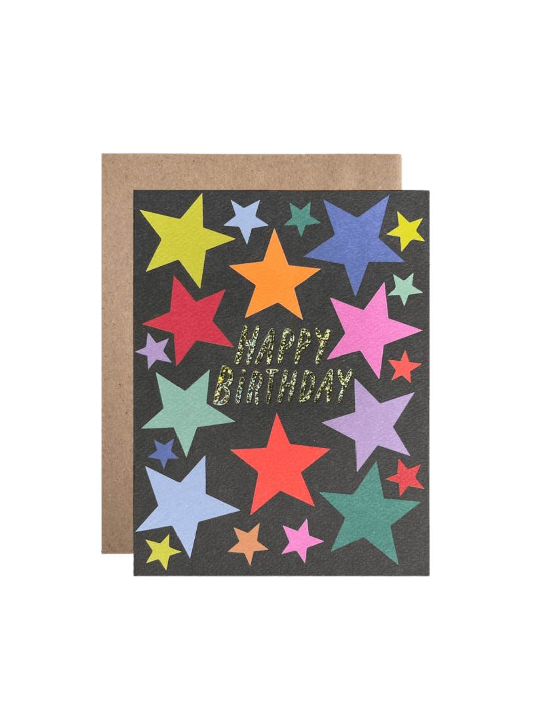 The Happy Birthday Stars Card from Hartland Cards features vibrant, colorful stars on a dark background with glittery gold text, resting in front of a brown kraft envelope | Twentyseven Toronto