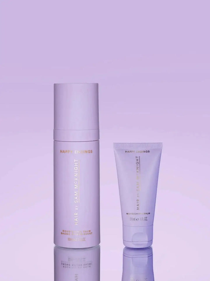 A full-size bottle and a travel-size tube of product stand side-by-side against a soft purple background to showcase the packaging of Hair by Sam McKnight Light Cleanse Hair & Scalp Shampoo | Twentyseven Toronto