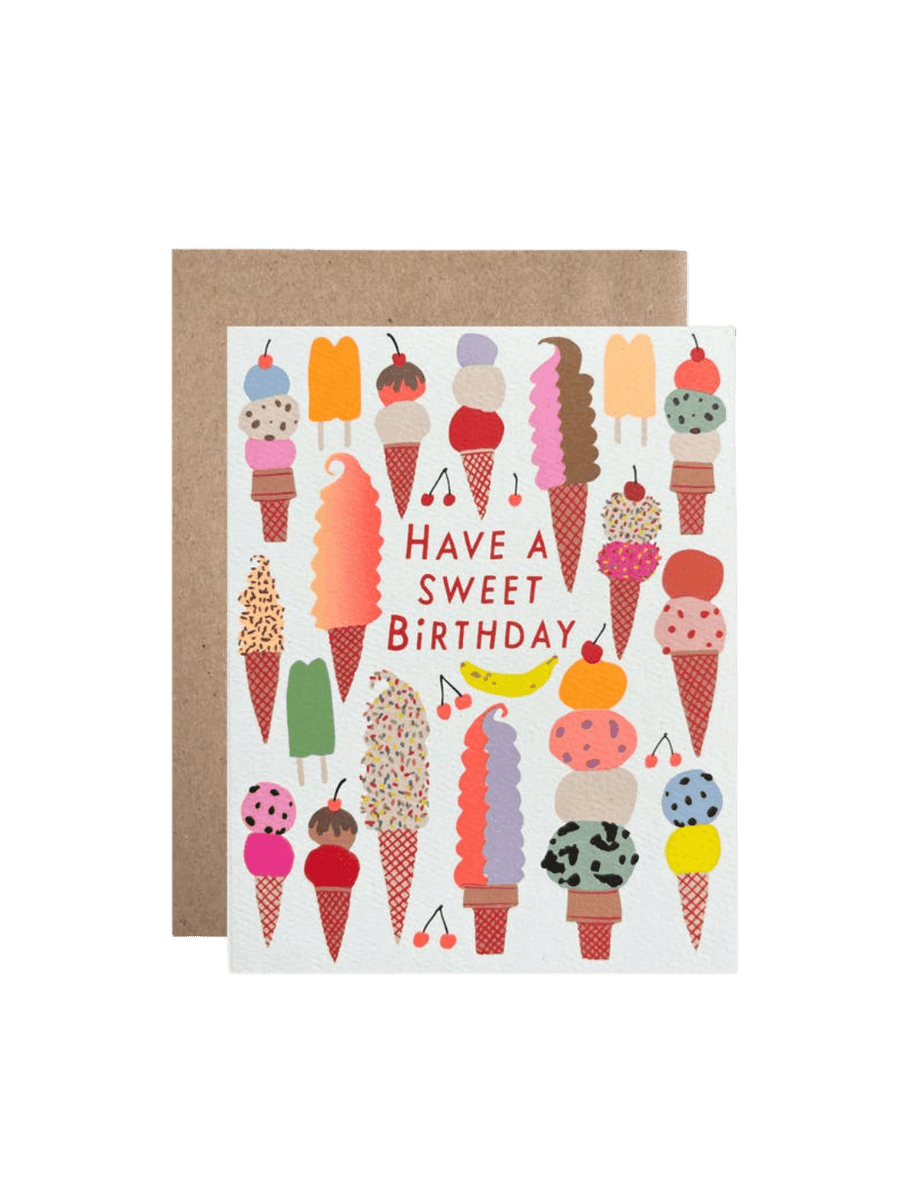 The Hartland Cards Have a Sweet Birthday Ice Cream Card features a white background filled with a variety of colorful illustrated frozen treats, including multi-scooped ice cream cones, soft-serve cones with sprinkles, and popsicles, all surrounding the text "HAVE A SWEET BIRTHDAY" printed in red lettering in the center, paired with a brown kraft envelope | Twentyseven