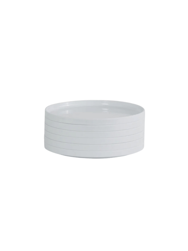 Stack of white plates from the Heller Max Dinnerware 7.5 inch Maxplate in White - Set of 6 on a transparent background | Twentyseven Toronto