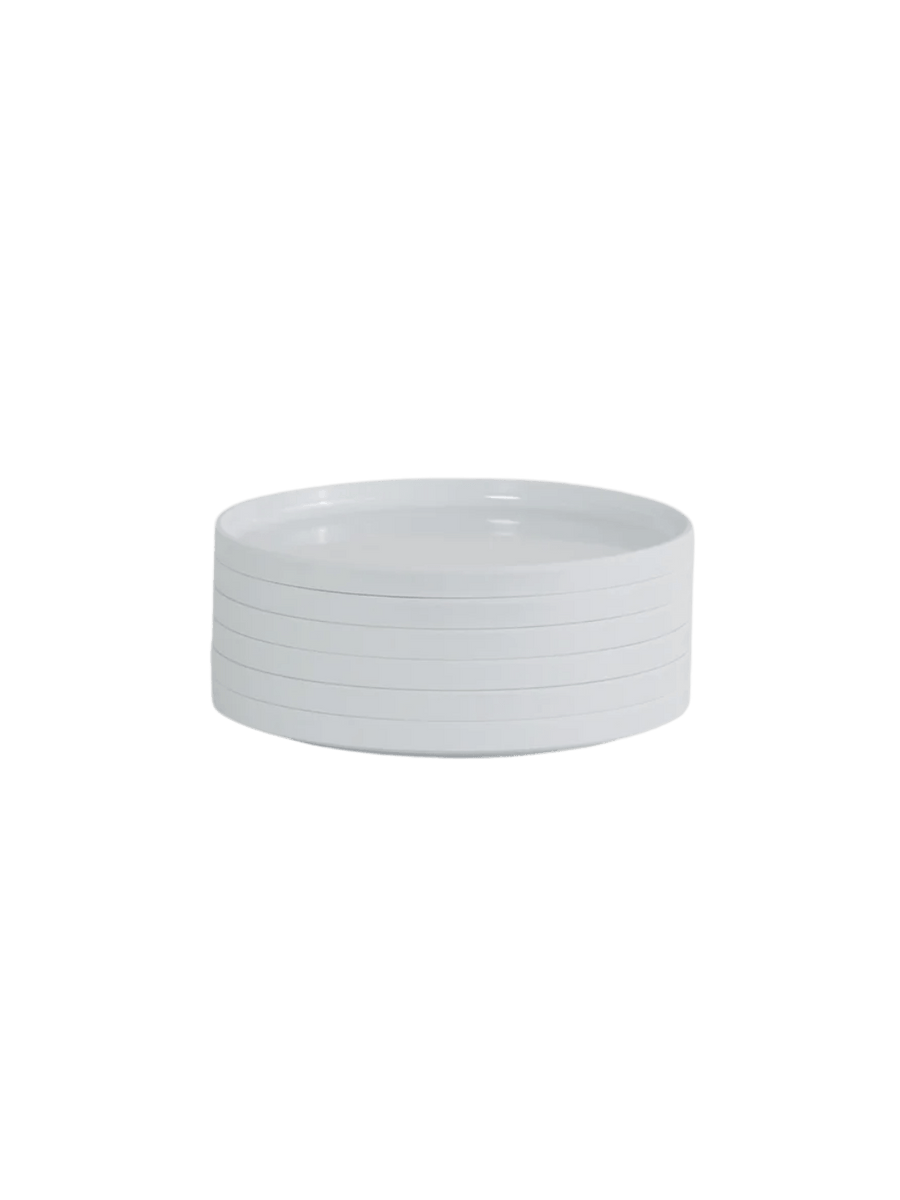 Stack of white plates from the Heller Max Dinnerware 7.5 inch Maxplate in White - Set of 6 on a transparent background | Twentyseven Toronto