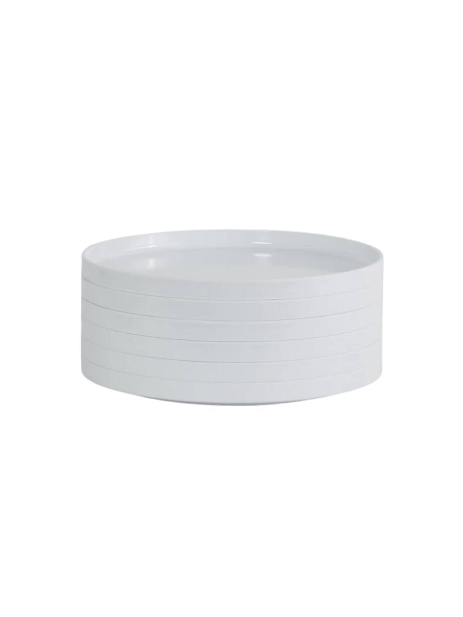 Stack of white plates from the Heller Max Dinnerware 9.75 inch Maxplate in White - Set of 6 on a transparent background | Twentyseven Toronto