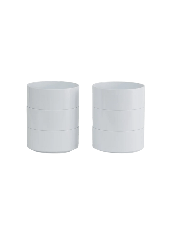 The Heller Max Dinnerware Maxbowl in White - Set of 6 is displayed as two separate stacks of three sleek white bowls | Twentyseven Toronto