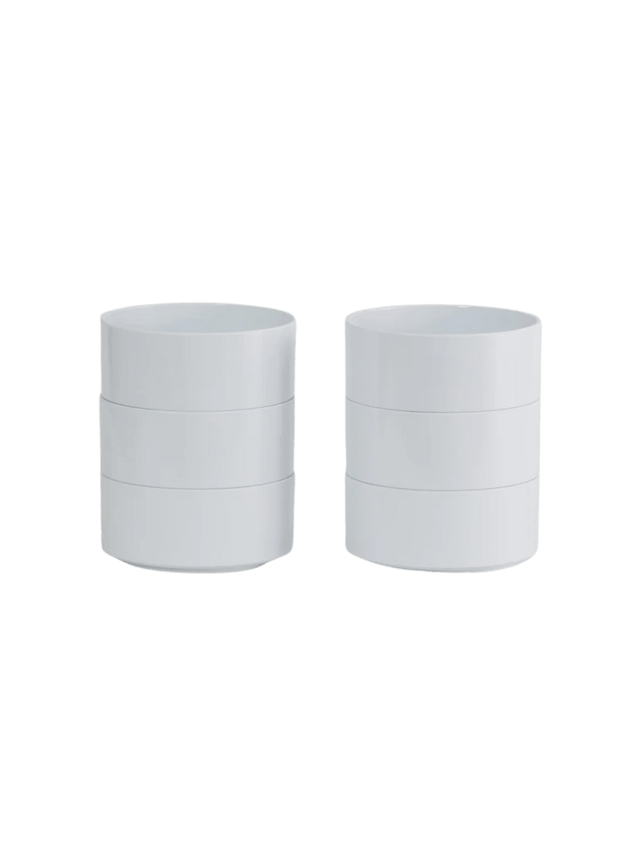 The Heller Max Dinnerware Maxbowl in White - Set of 6 is displayed as two separate stacks of three sleek white bowls | Twentyseven Toronto