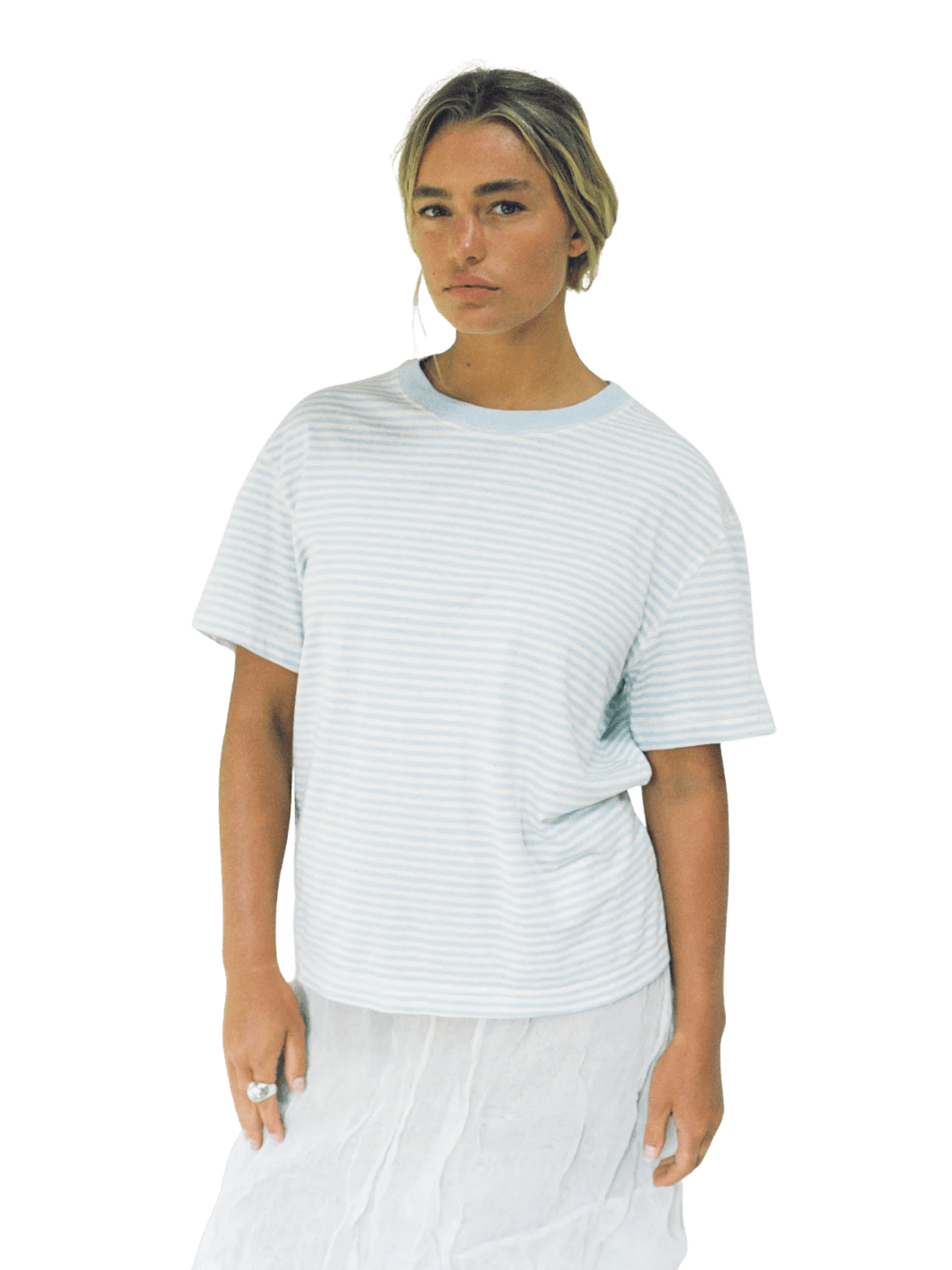 A model wearing the casual, short-sleeved Merge Goods Hemp Rover Tee in Daydream Stripes | Twentyseven Toronto