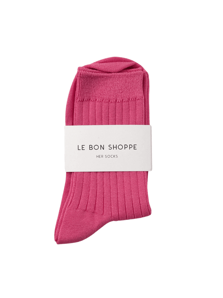 Le Bon Shoppe Her Socks (MC Cotton) in Bright Pink with a white label on a transparent background | Twentyseven Toronto