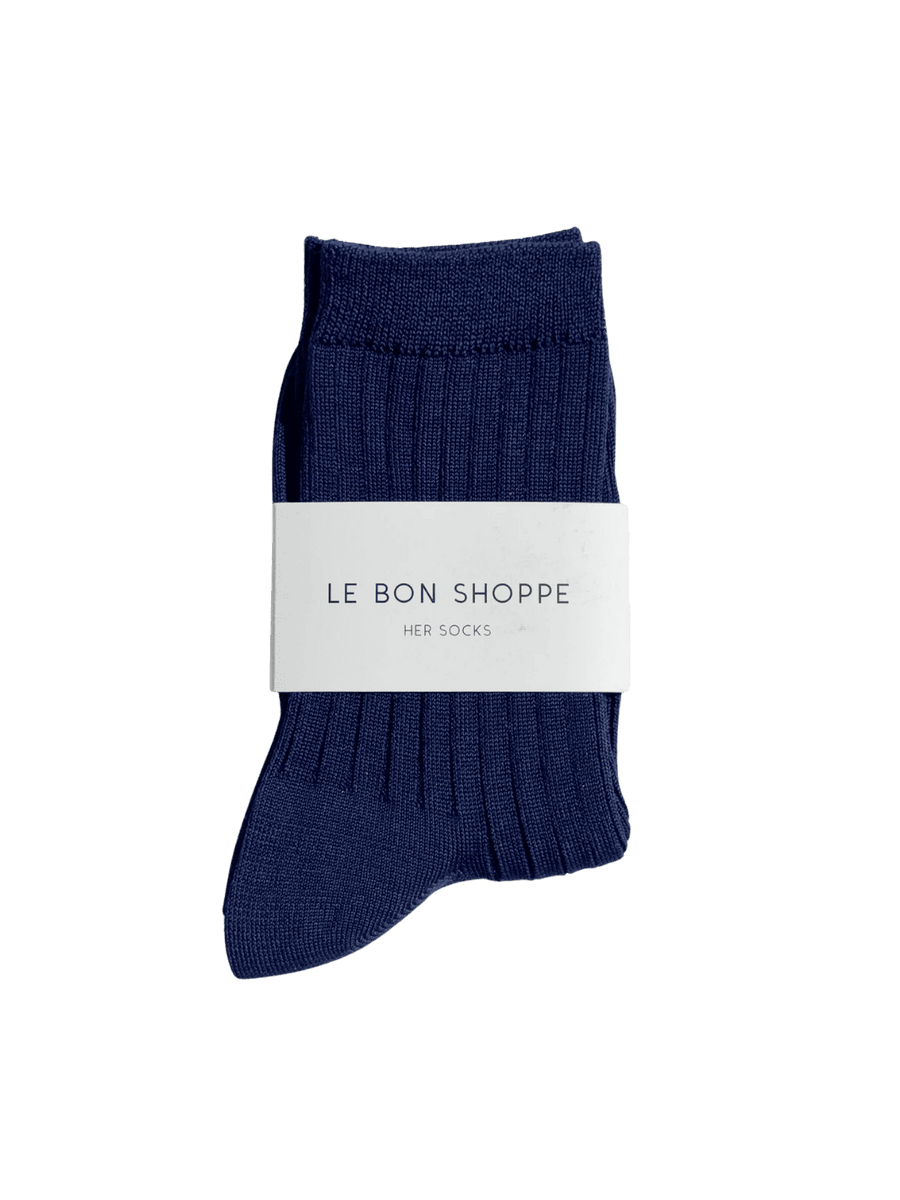 Navy blue Le Bon Shoppe Her Socks (MC Cotton) in Midnight with a white label on a transparent background | Twentyseven Toronto