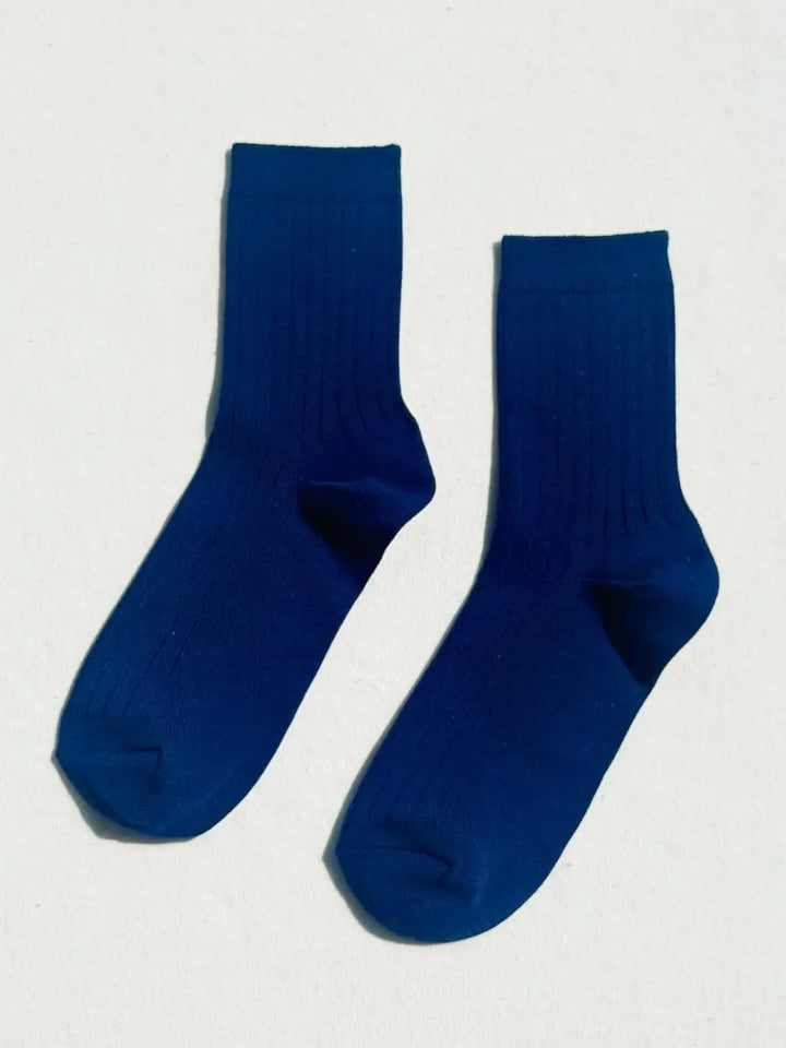 Pair of navy blue Le Bon Shoppe Her Socks in 'Midnight' on a white background | Twentyseven Toronto