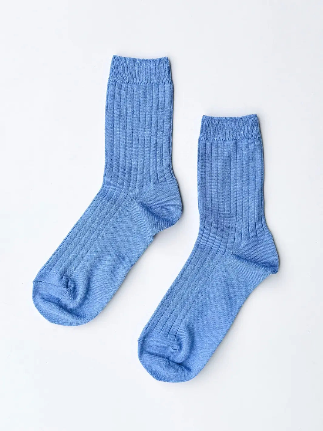 Pair of blue Le Bon Shoppe Her Socks in Periwinkle on a white background | Twentyseven Toronto