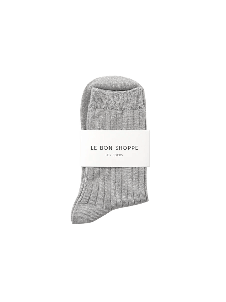 Le Bon Shoppe Her Socks Lurex in Silver folded with branded packaging, featuring a ribbed knit and metallic shimmer | Twentyseven Toronto