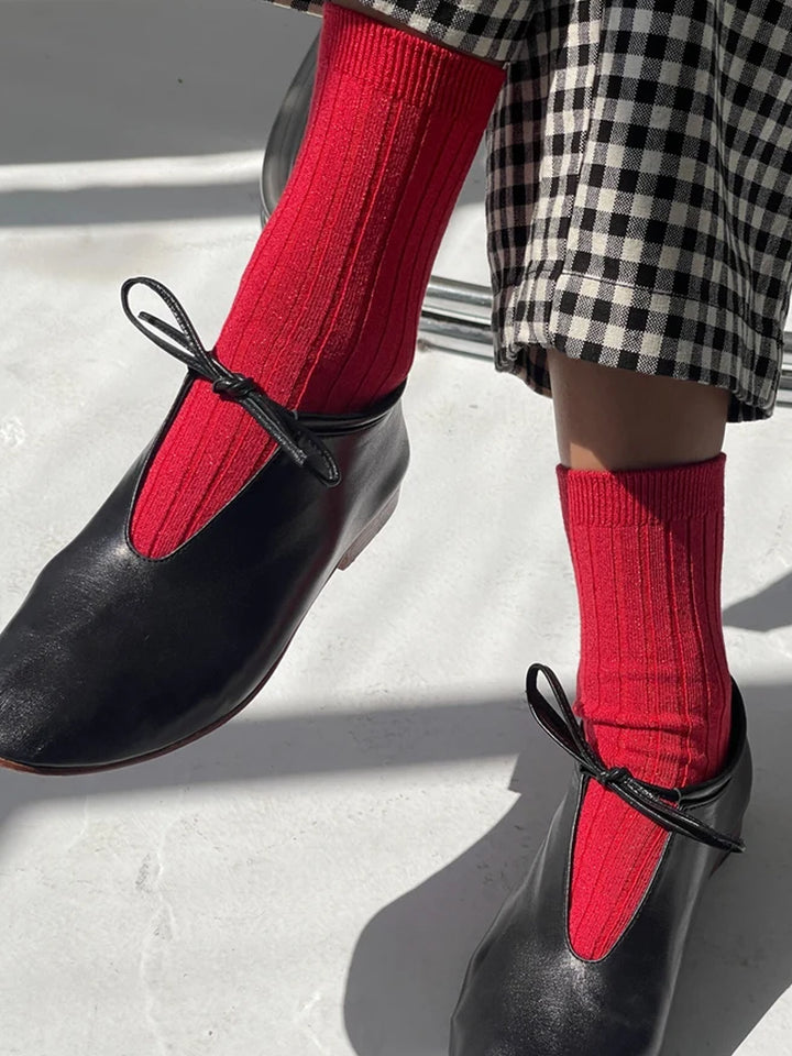 Pair of Le Bon Shoppe Her Socks Lurex in Ruby Glitter featuring a vibrant red ribbed knit with subtle metallic shimmer | Twentyseven Toronto