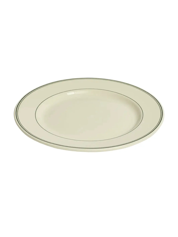 An angled overhead view displays the smooth surface and vintage diner-style aesthetic of the HL Greenband - Main Plate (11.12") from Fishs Eddy | Twentyseven Toronto