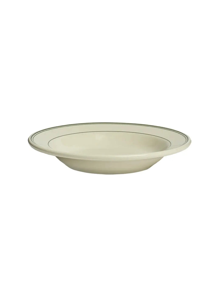 A side view of the HL Greenband - Soup Bowl (12.75oz) from Fishs Eddy showcases its deep, sloped ceramic basin and classic green rim border | Twentyseven Toronto