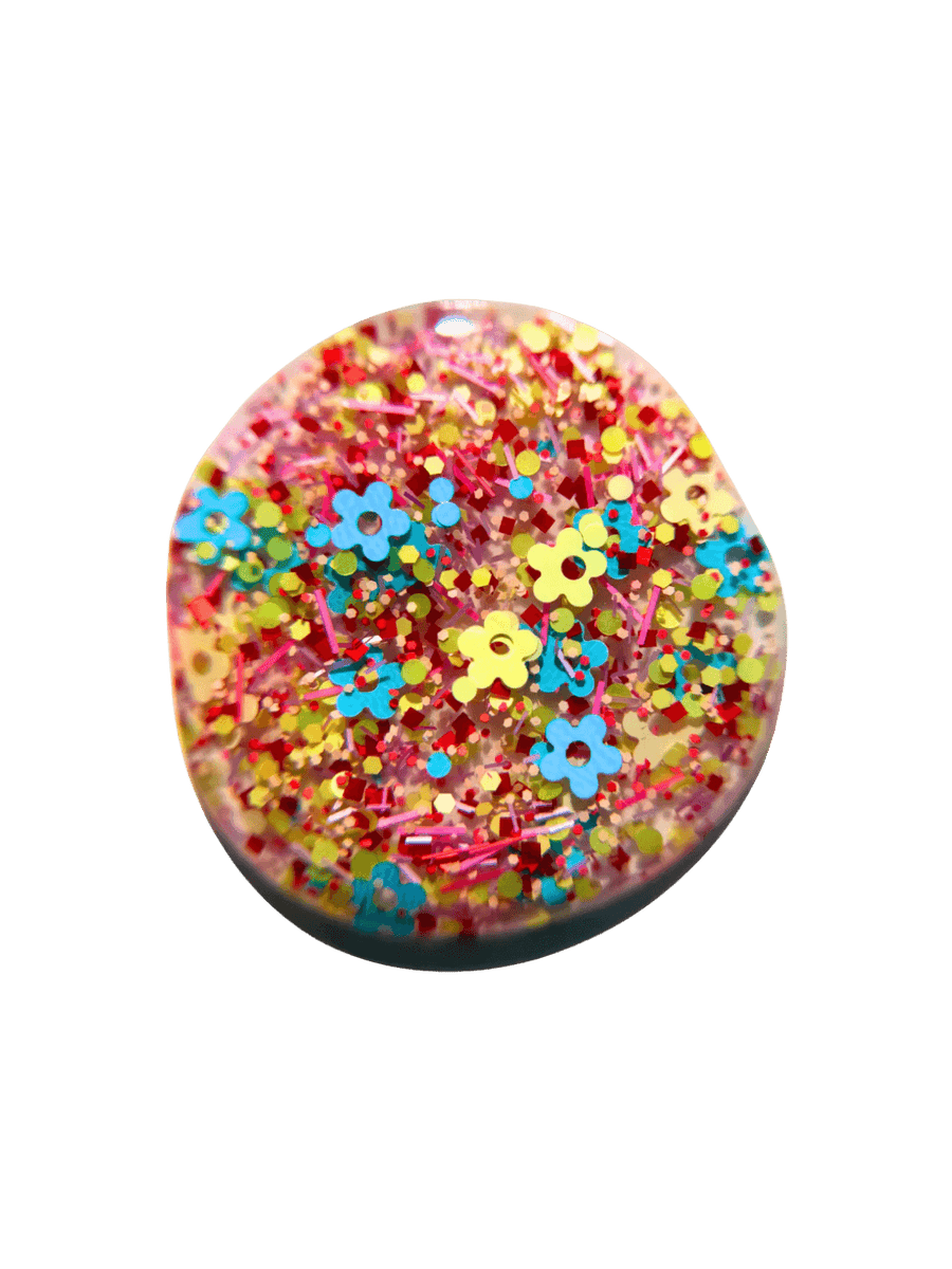 Product swatch of pastel, fun shaped glitter 'Hot Pants Nail Polish' by Death Valley Nails on a transparent background | Twentyseven Toronto