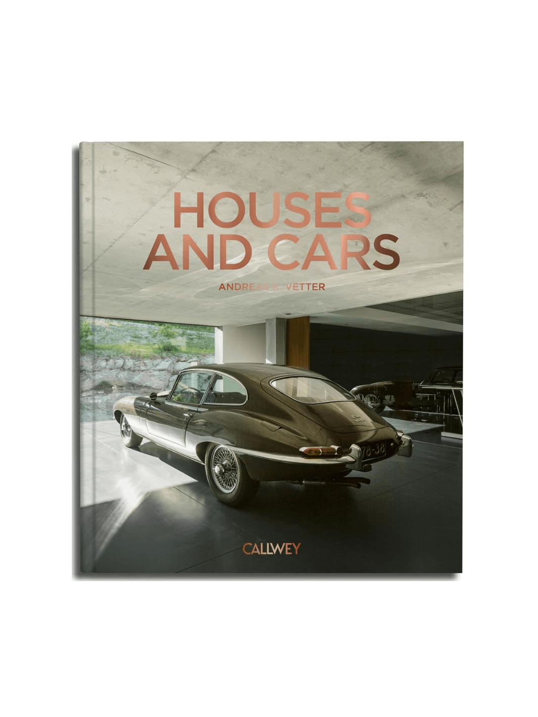 Front cover of the book Houses and Cars by Andreas K. Vetter, featuring a high-contrast, black-and-white photograph of a classic sports car parked in front of a modern, minimalist house with clean lines and large glass windows | Twentyseven Toronto