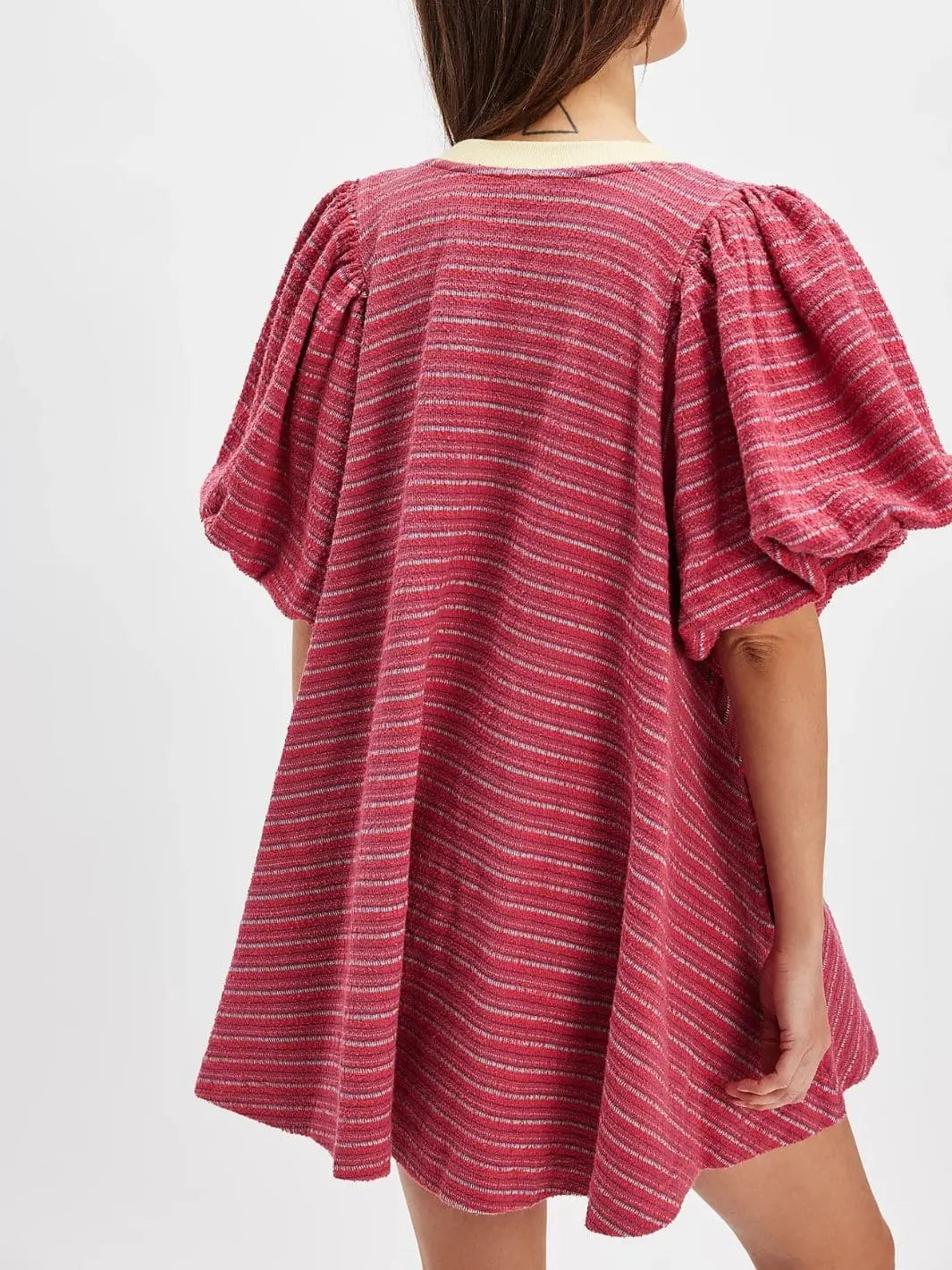 A view from behind showcases the wide cream collar, oversized A-line fit, and back puff sleeve details of the Free People Hudson Pullover - Red Combo worn as a tunic or mini dress | Twentyseven Toronto