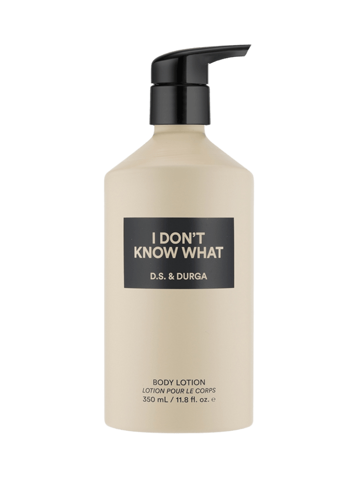 Cream body lotion 350ml bottle with 'I Don't Know What' label from DS & Durga on a transparent background | Twentyseven Toronto