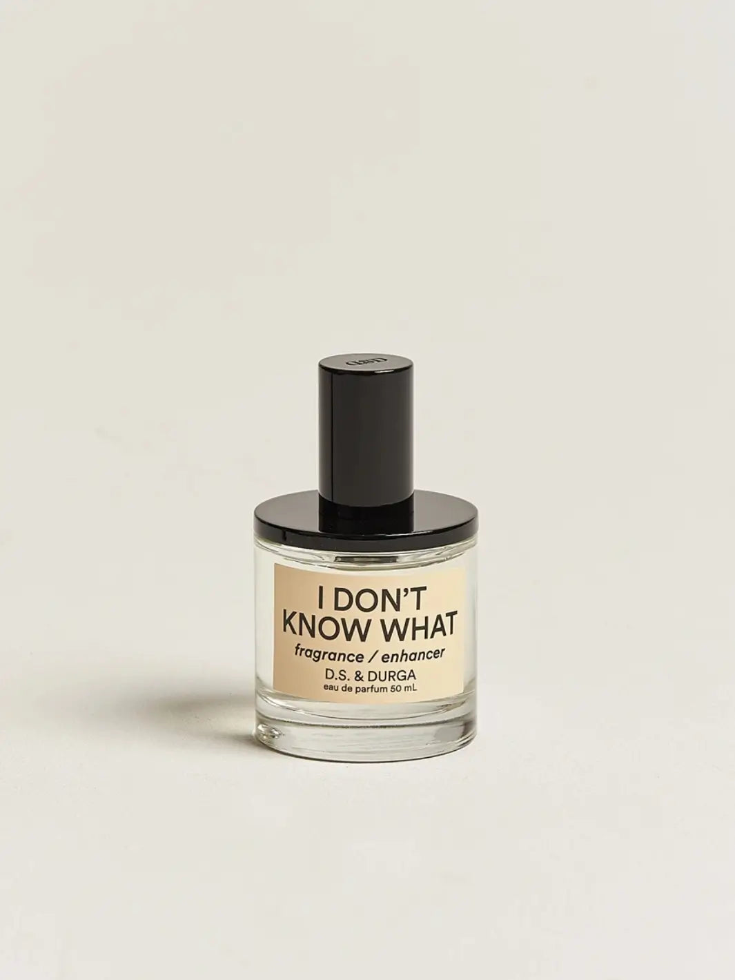 Perfume bottle labeled 'I Don't Know What' by D.S. & Durga on a beige background | Twentyseven Toronto