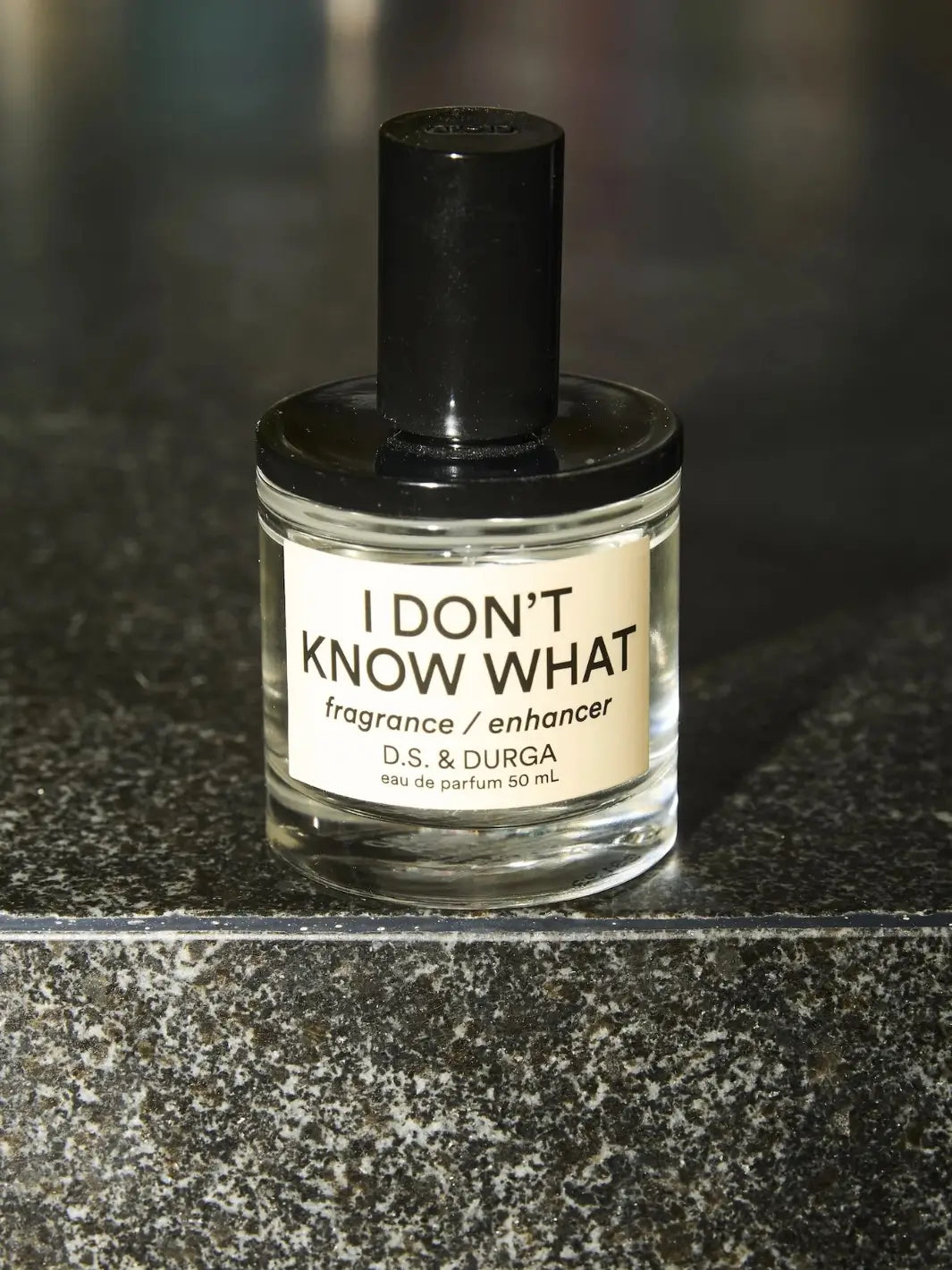 Perfume bottle labeled 'I Don't Know What' by D.S. & Durga on a dark surface | Twentyseven Toronto