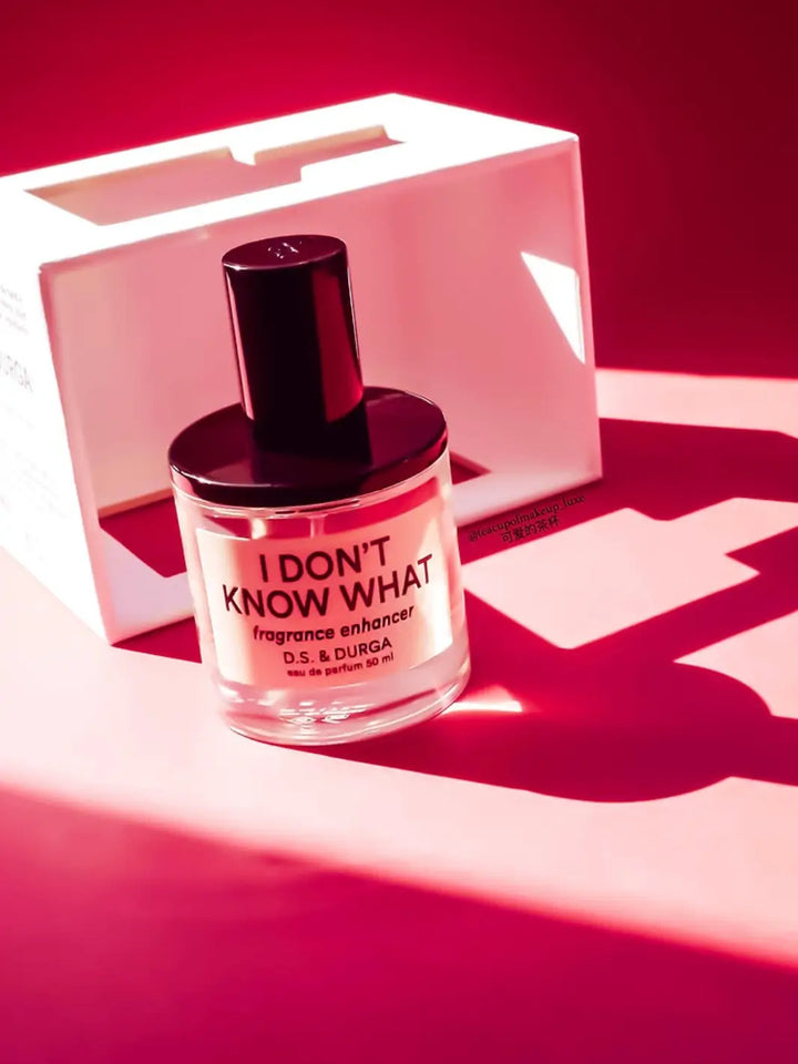 Perfume bottle labeled 'I Don't Know What' by D.S. & Durga on a red background | Twentyseven Toronto