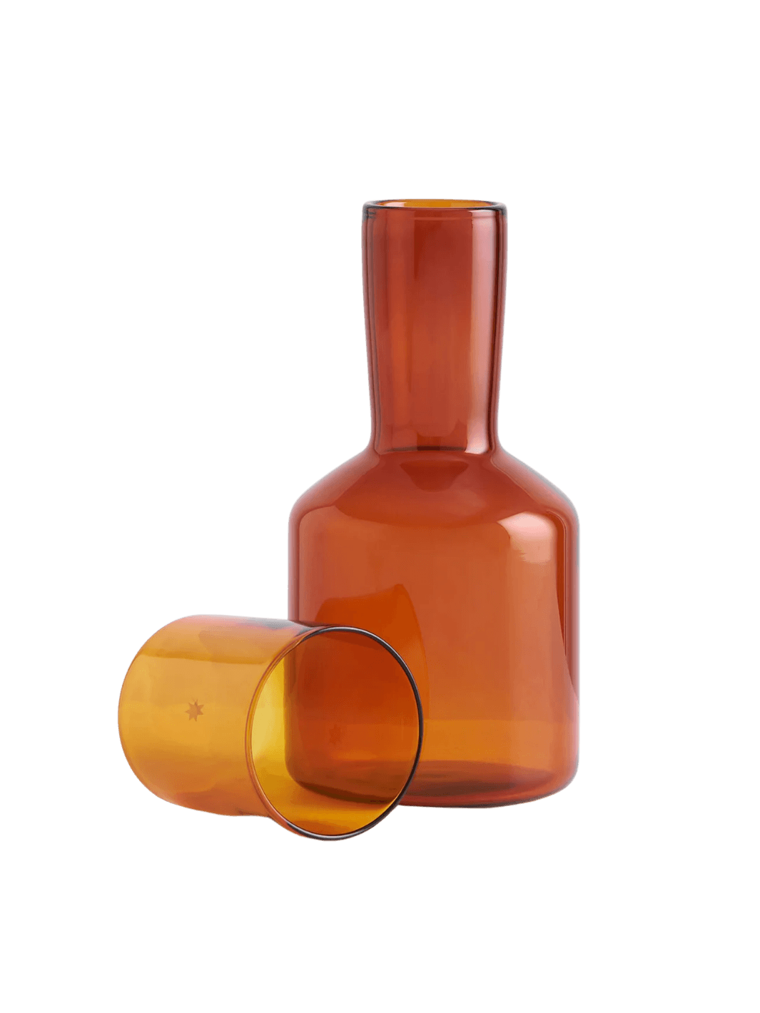 Amber glass 'J'ai Soif' carafe and glass from Maison Balzac on a transparent background | Twentyseven Toronto