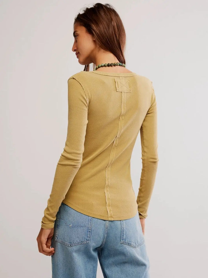 A back view displays the exposed center seam detail and square yoke patch of the casual Free People Jamie Henley - Tobacco | Twentyseven Toronto